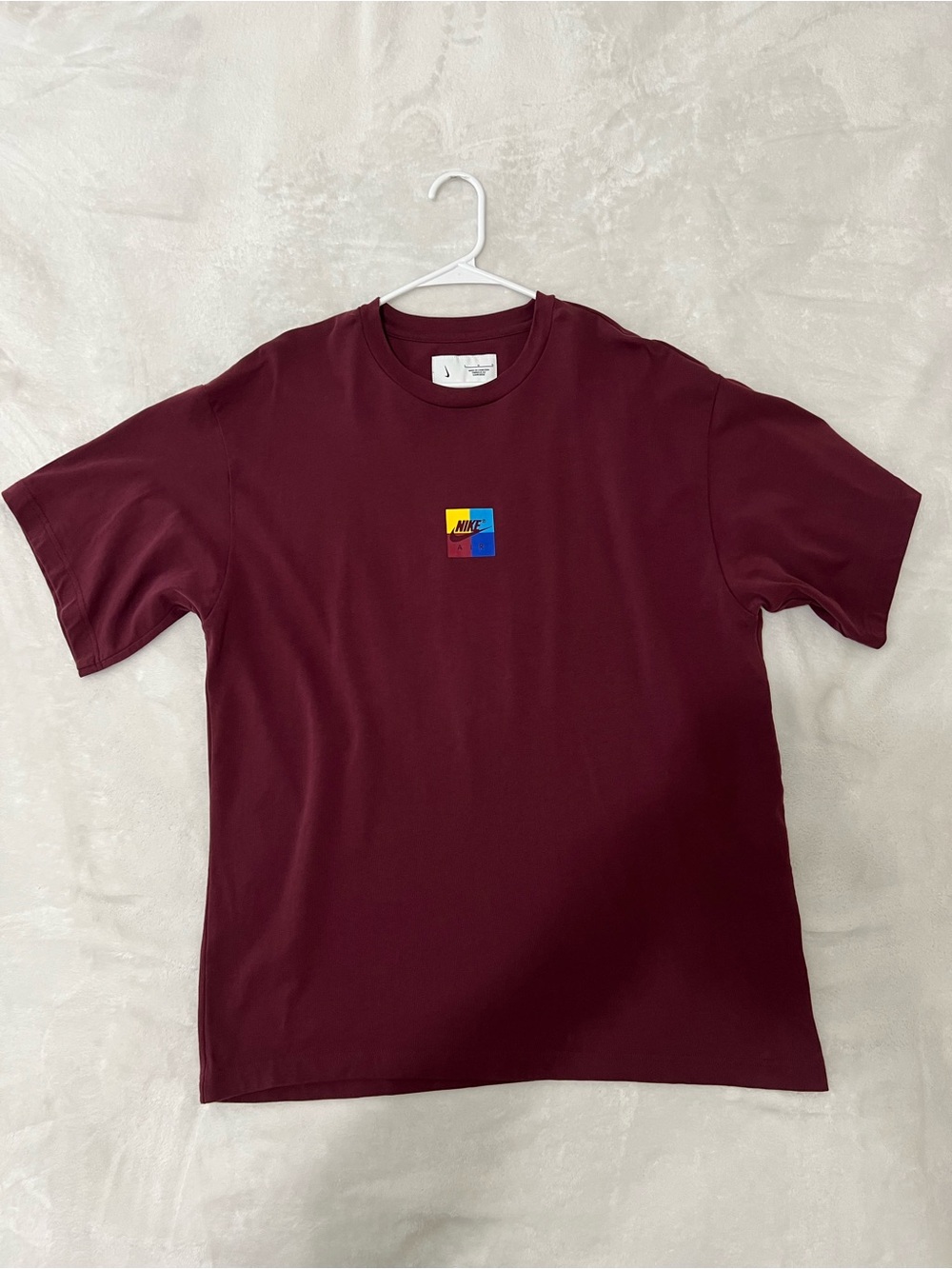 Nike Men's Burgundy Short-Sleeve Tee with Multicolor Chest Logo